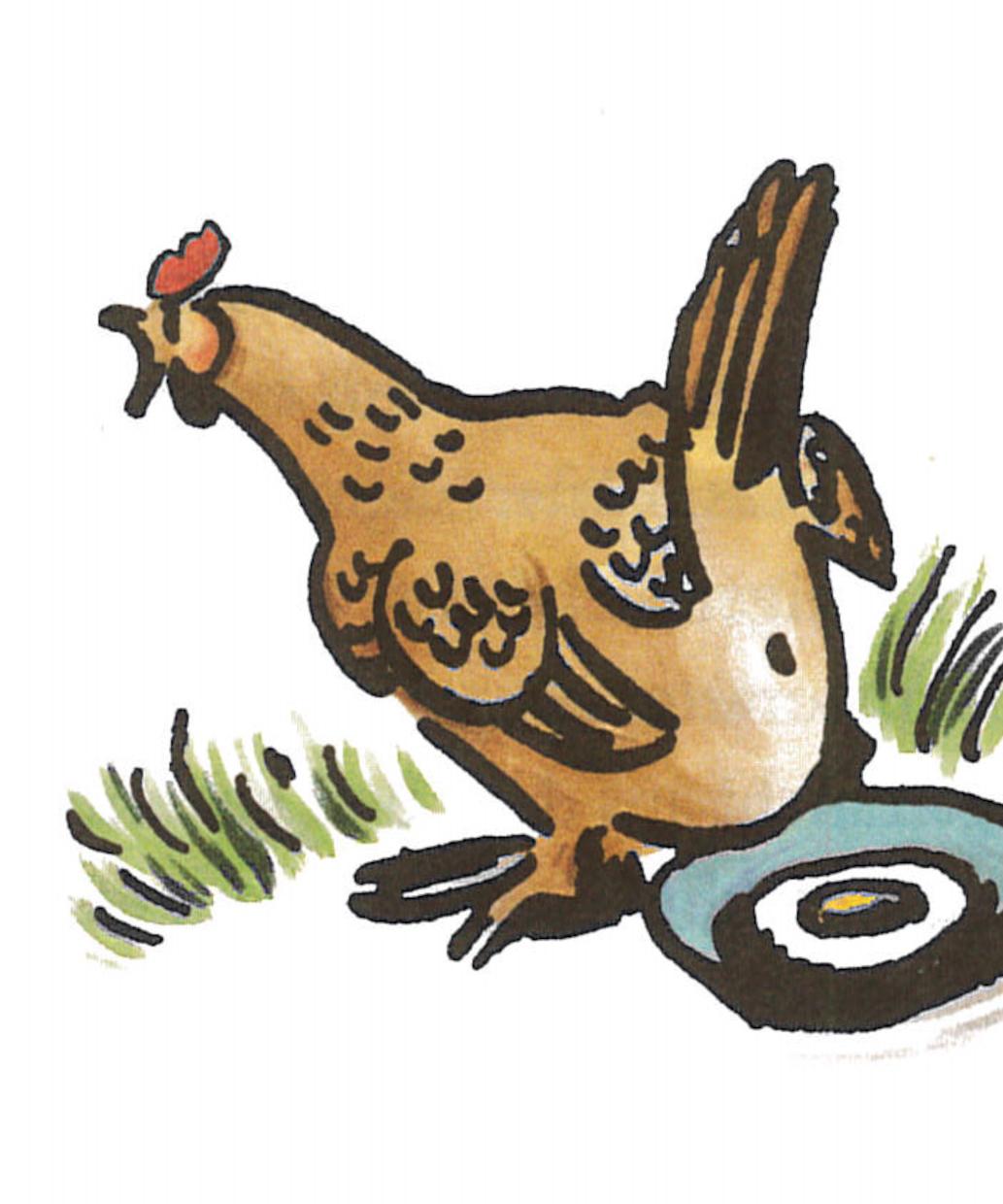 Ein Huhn legt ein Ei in eine Bratpfanne